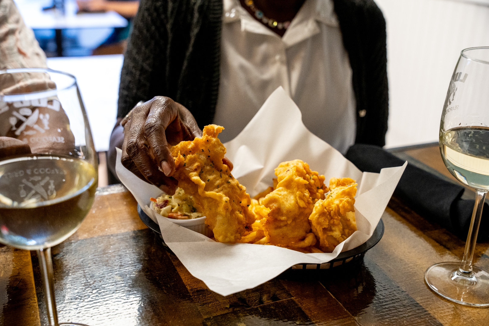 Beer battered fish & chips basket with coleslaw and white wine — Luc's Seafood & Grill